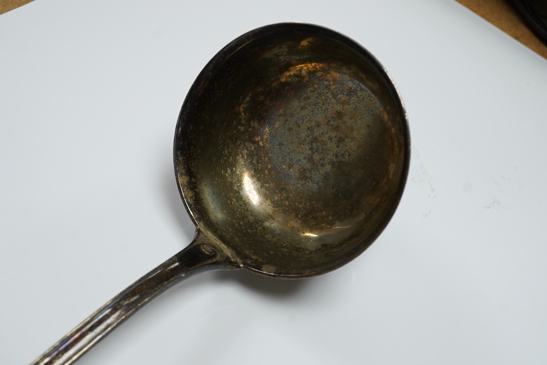 A German 800 standard white metal soup ladle, 36.3cm, 8.7oz.